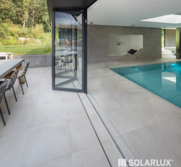 Bi fold doors in front of a swimming pool